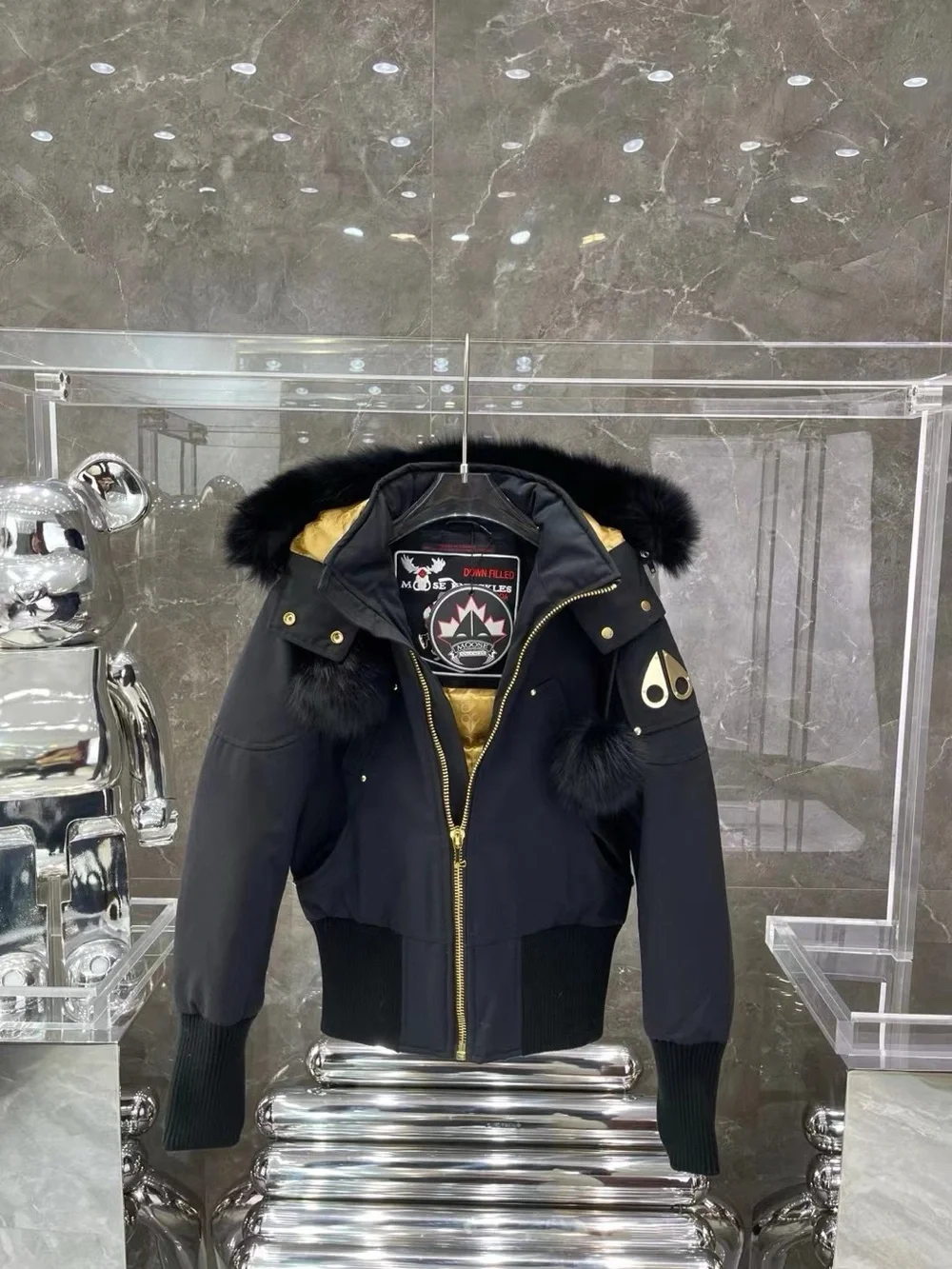 Moose Knuckles Black Hooded Puffer Jacket with Gold Lining
